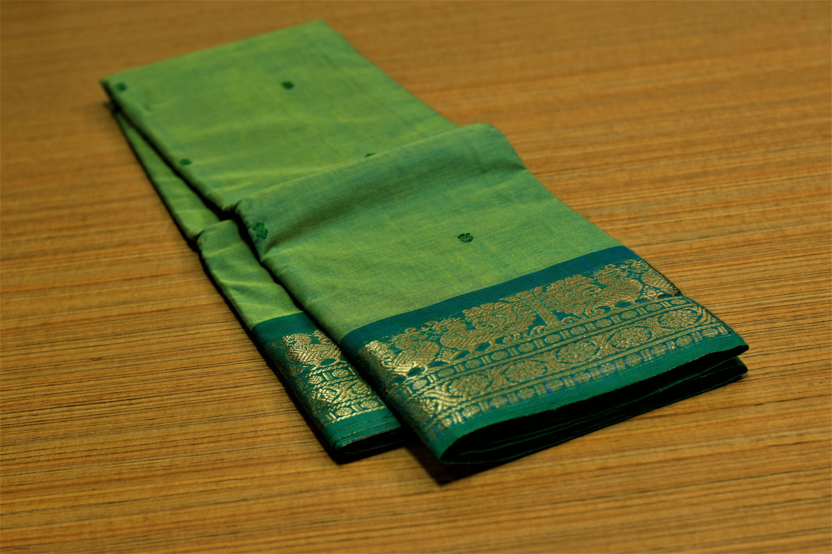 Parrot Green Kaanchi Cotton Saree with Teal Blue Peacock Zari Border & Blouse Piece