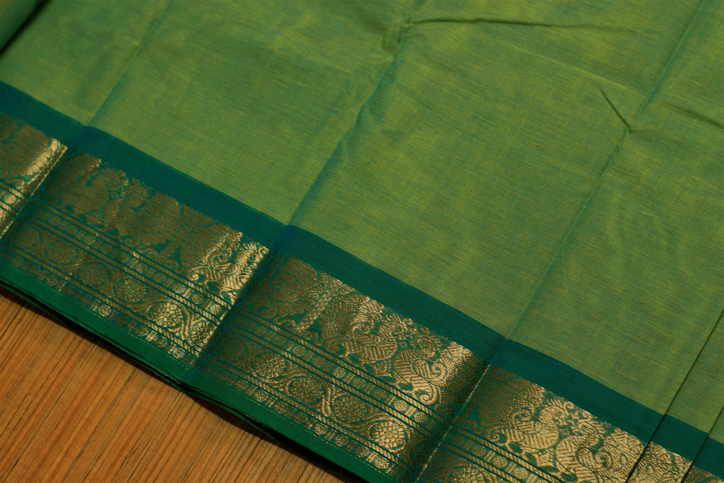 Parrot Green Kaanchi Cotton Saree with Teal Blue Peacock Zari Border & Blouse Piece