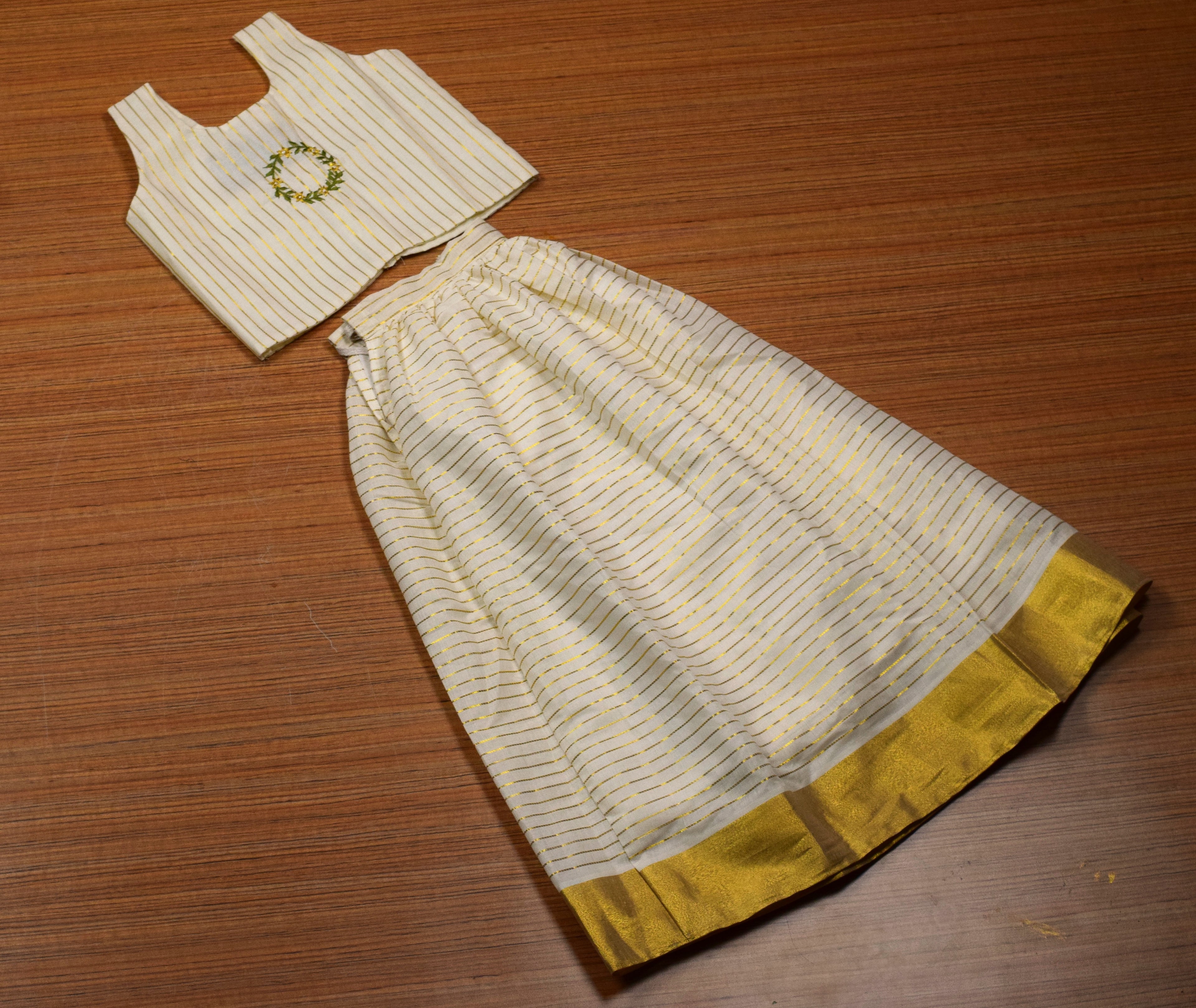 Girls Kerala Traditional Skirt & Top Set – White with Golden Stripes | Onam Festive Wear | Sleeveless Ethnic Outfit