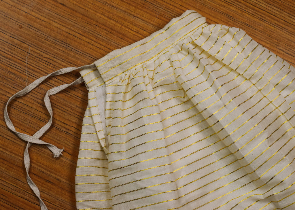 Girls Kerala Traditional Skirt & Top Set – White with Golden Stripes | Onam Festive Wear | Sleeveless Ethnic Outfit