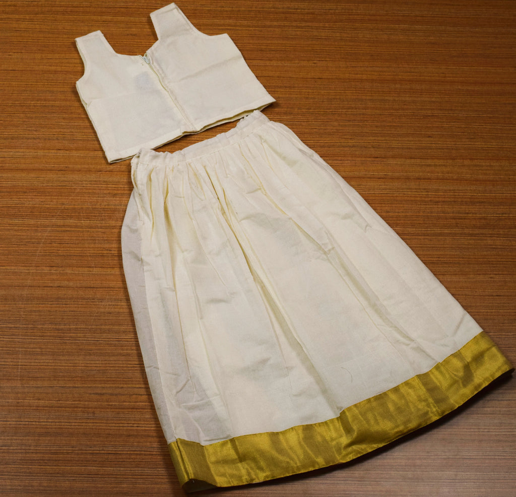 Girls Traditional Onam Skirt & Top Set – Off White Cotton Dress with Golden Kasavu Border & Lotus Embroidery