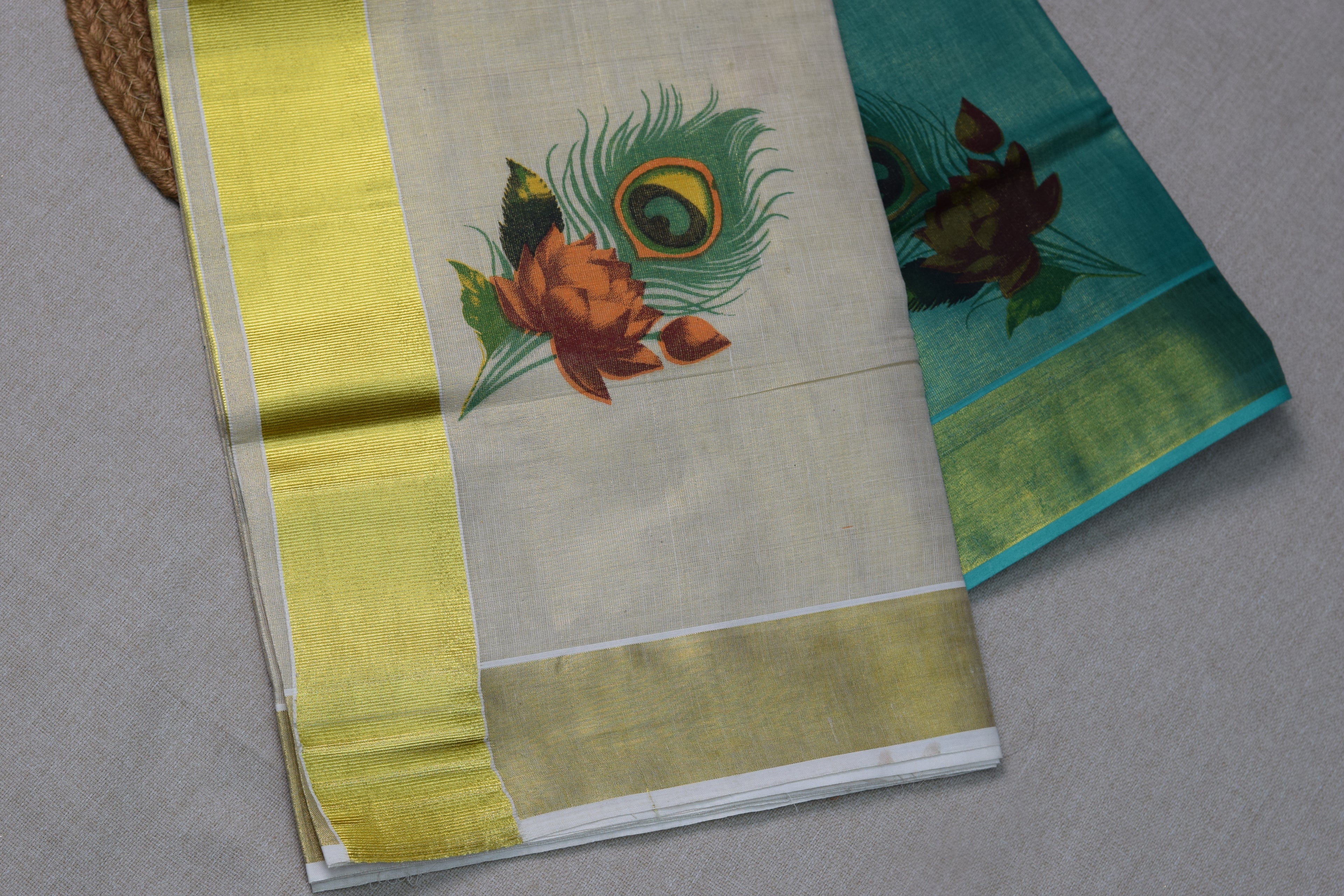 Kerala Kasavu Cotton Saree with Teal Tissue Pallu & Peacock Feather Block Print