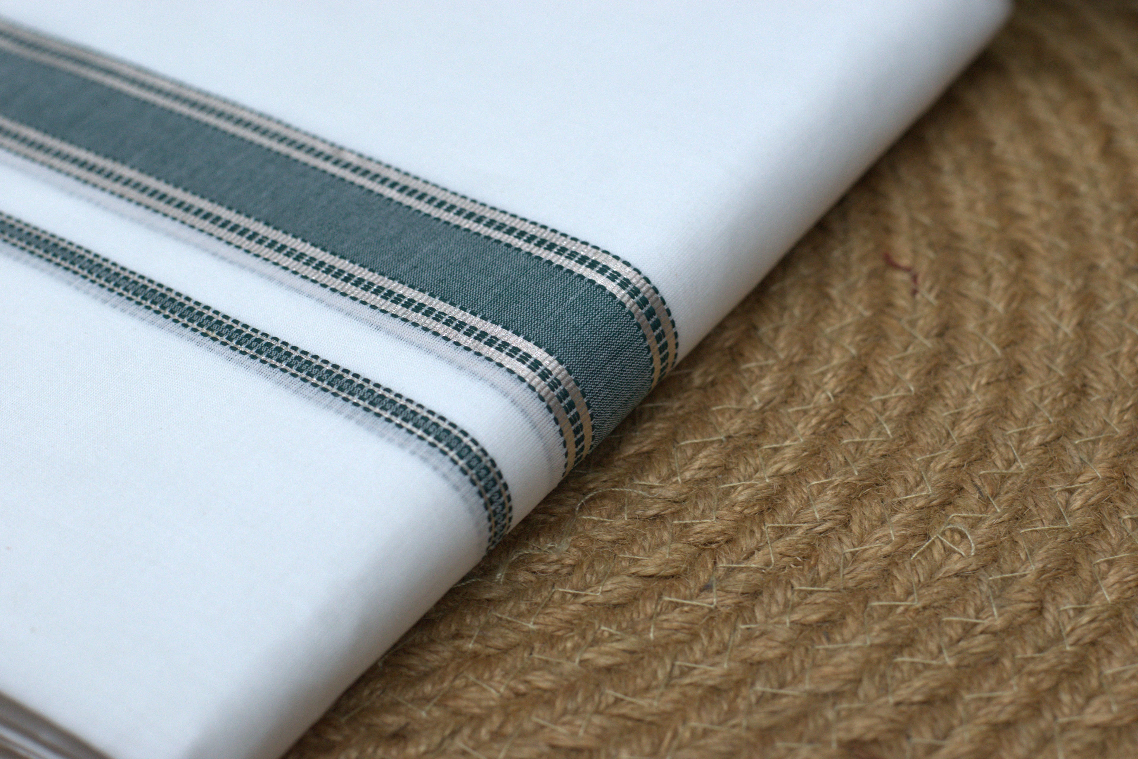 Premium White Cotton Mundu with Elegant Dark Green &Silver Kasavu Border