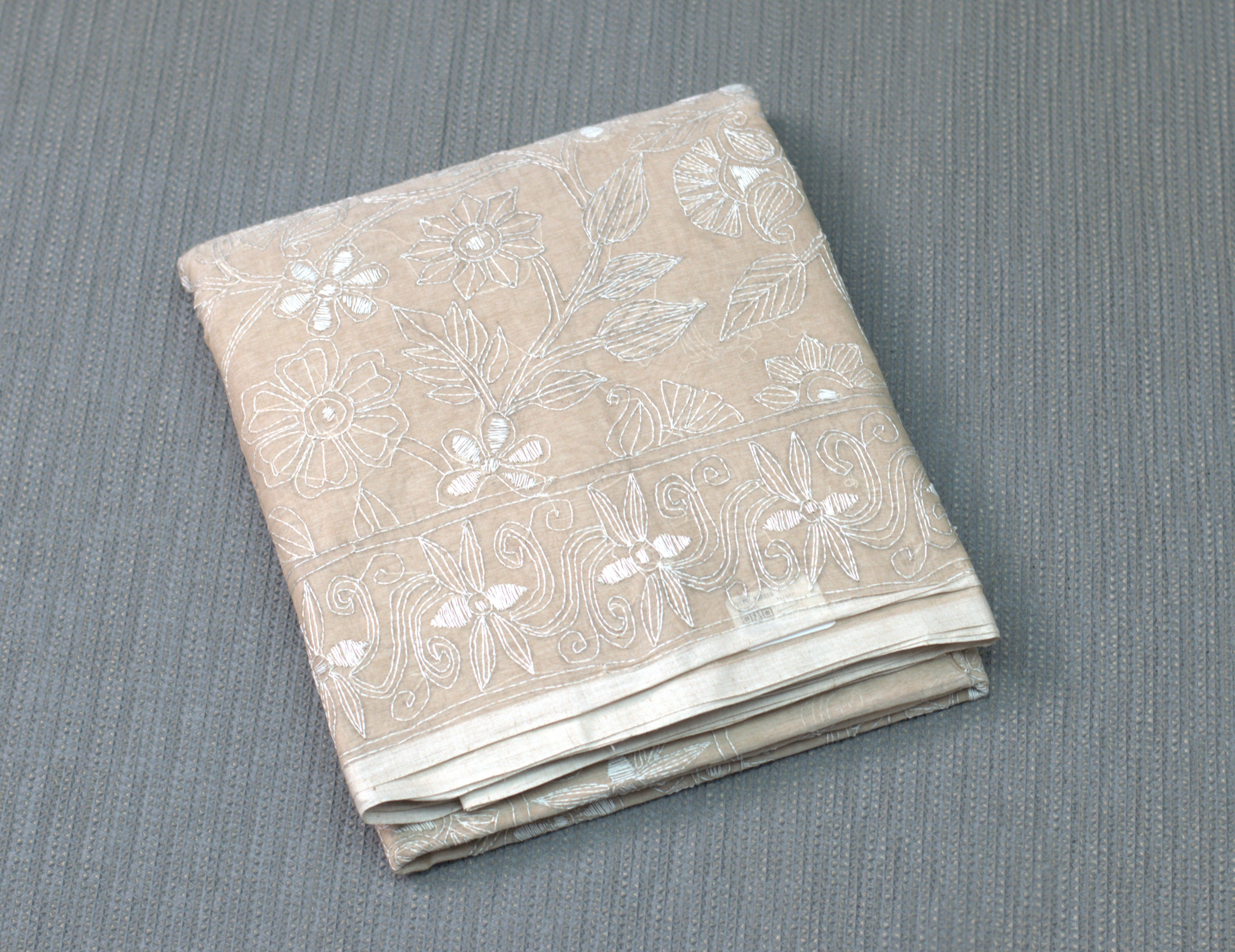 Elegant Beige Embroidered Saree with Intricate Floral Border
