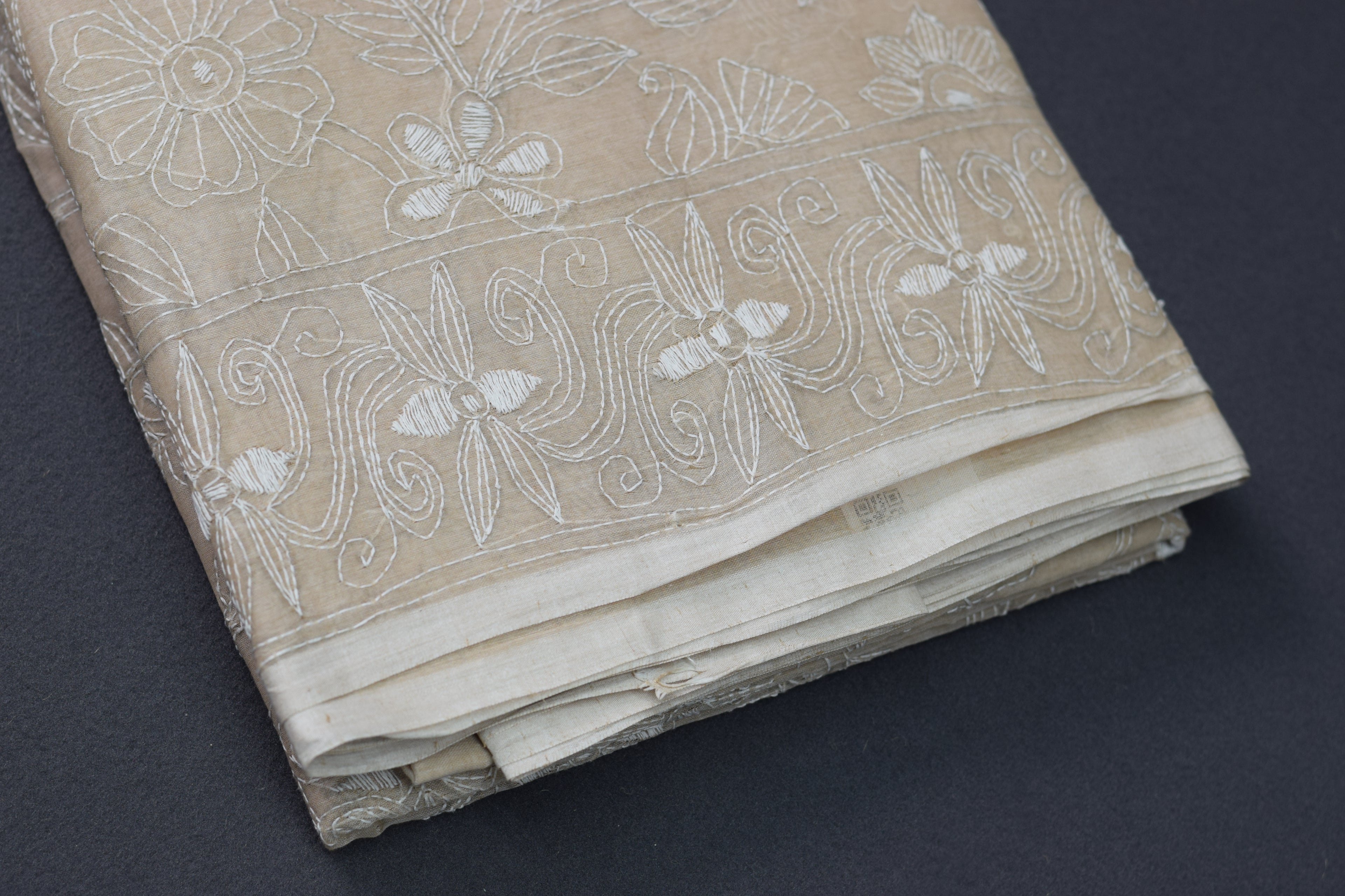 Elegant Beige Embroidered Saree with Intricate Floral Border