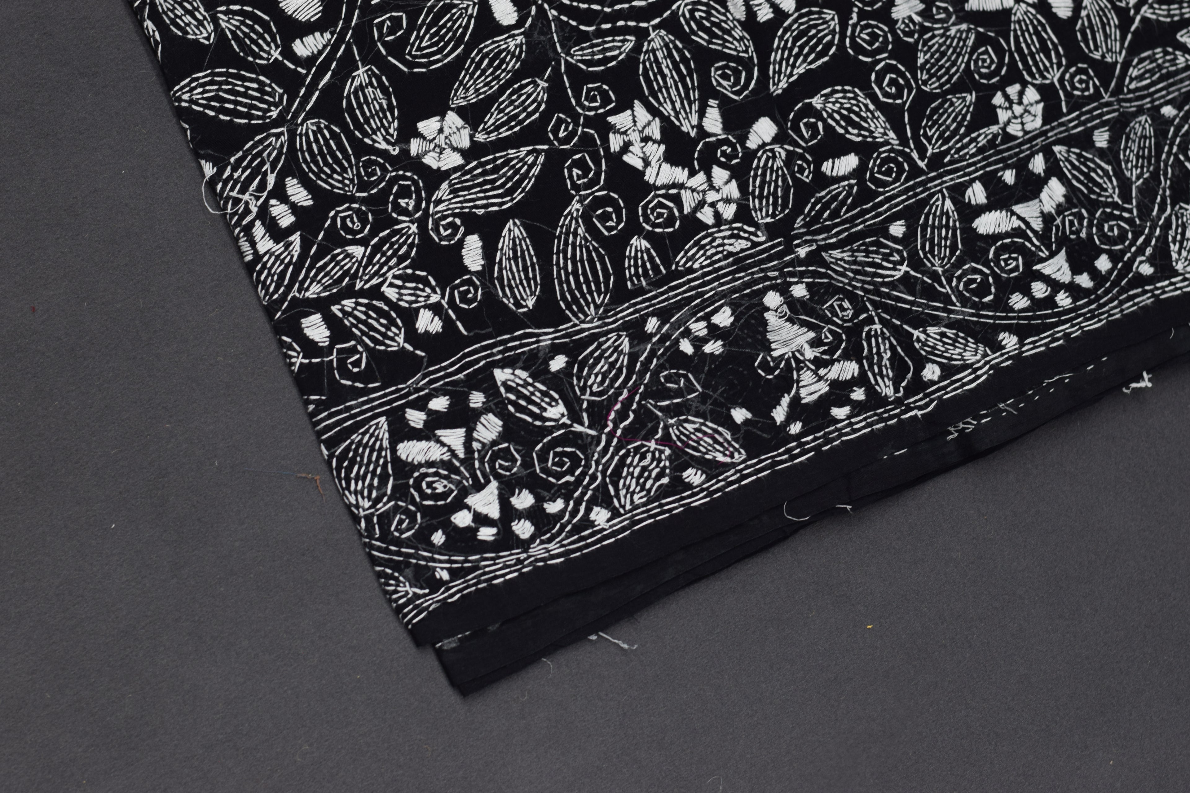 Midnight Noir Hand-Embroidered Cotton Saree with Intricate Floral Border