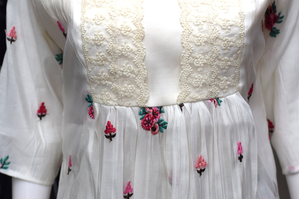Elegant Ivory Floral Embroidered Ladies Top- mul chanderi