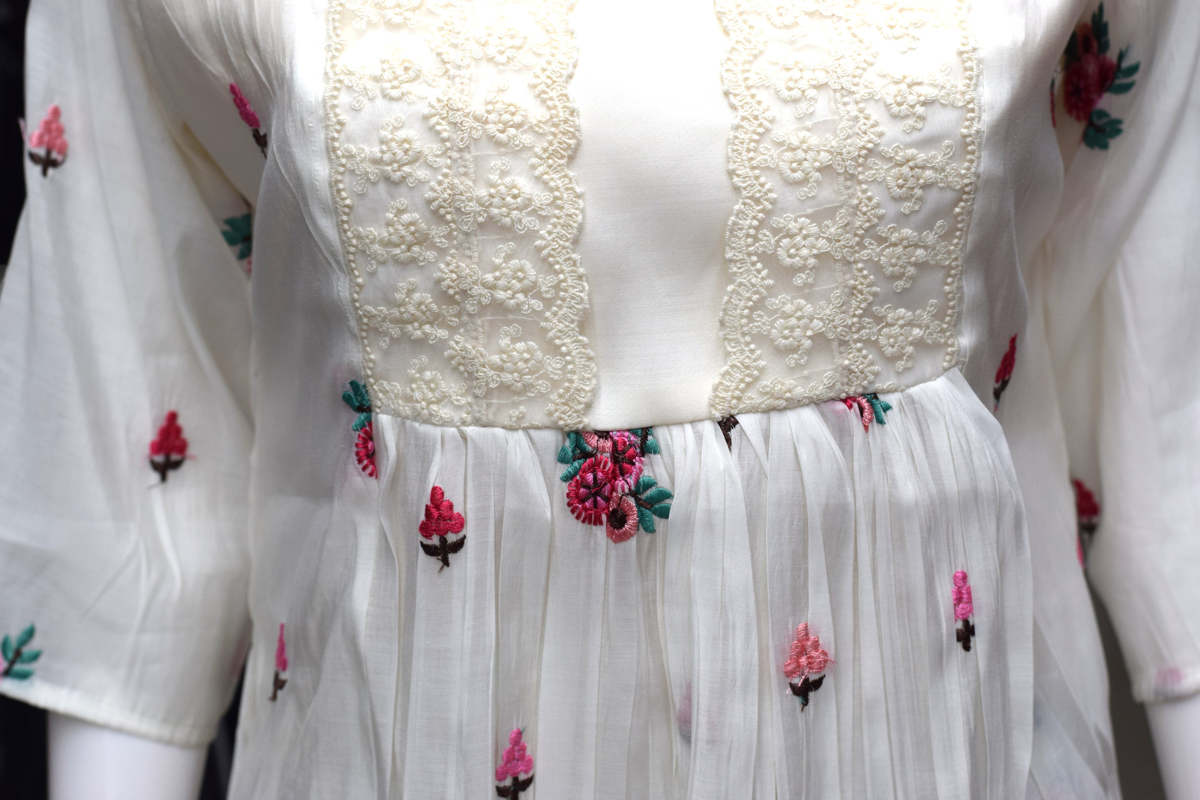 Elegant Ivory Floral Embroidered Ladies Top- mul chanderi
