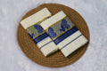 Handwoven Kerala Mundu Set with Traditional Peacock Design - Main Product Image - Nushio