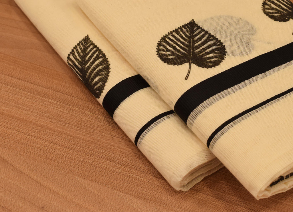Women's Kerala Set Mundu with Black Leaf Print & Traditional Border | Off-White Cotton Set