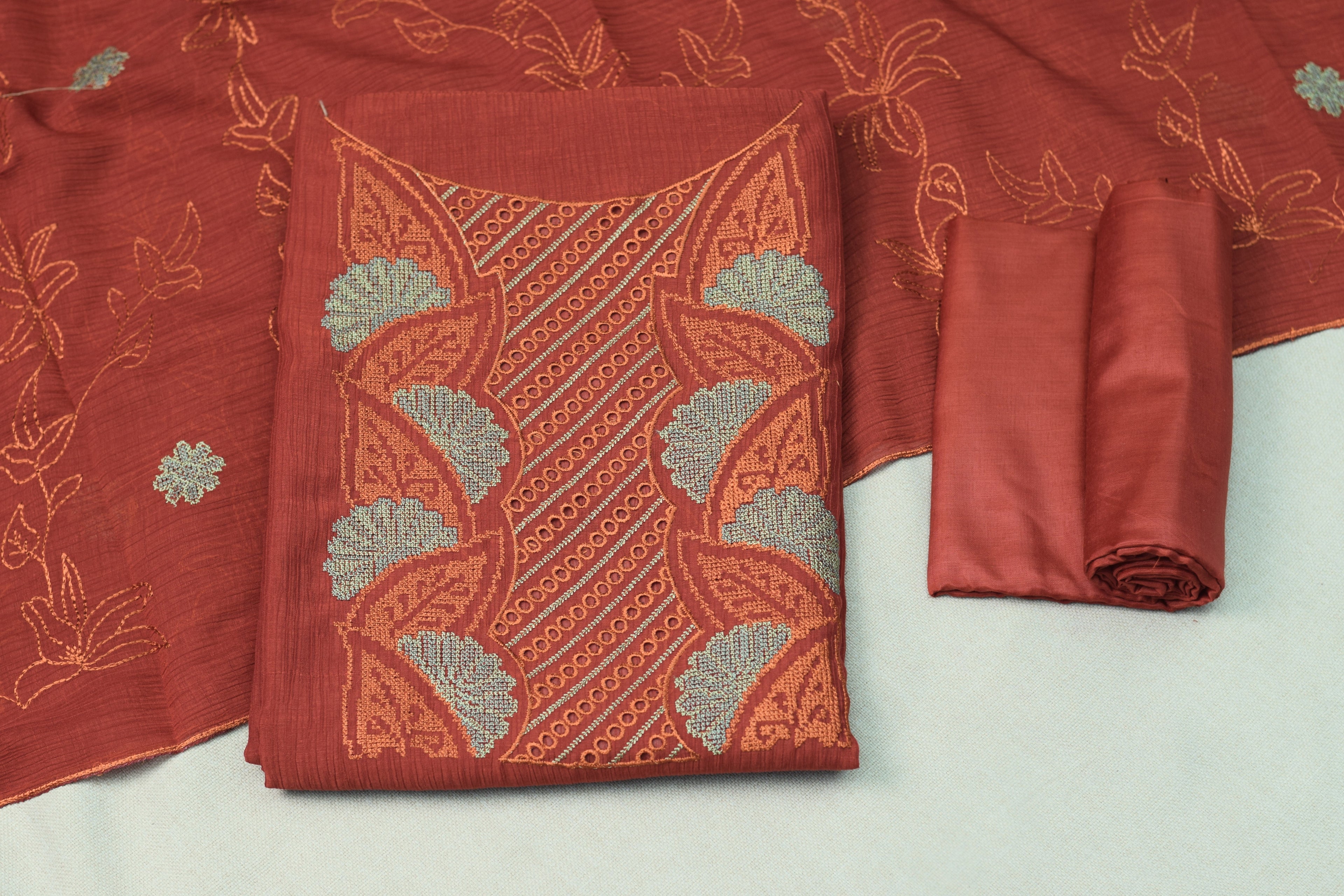 Rust Orange Christ Georgette Churidar Material Set with Embroidered Neck Design & Dupatta