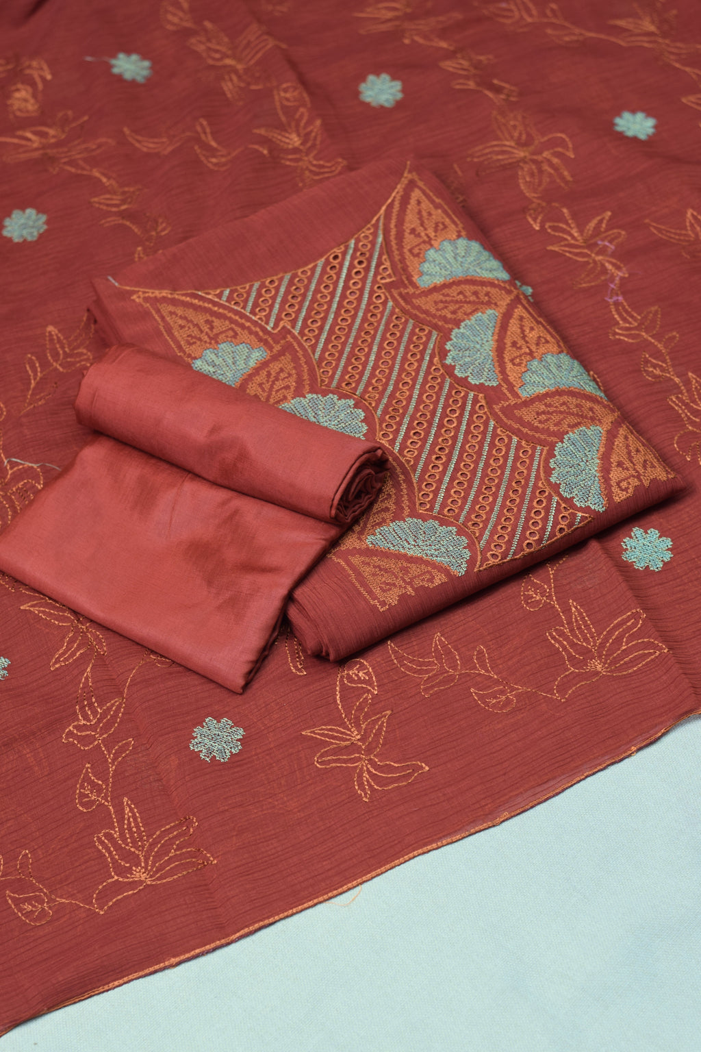 Rust Orange Christ Georgette Churidar Material Set with Embroidered Neck Design & Dupatta