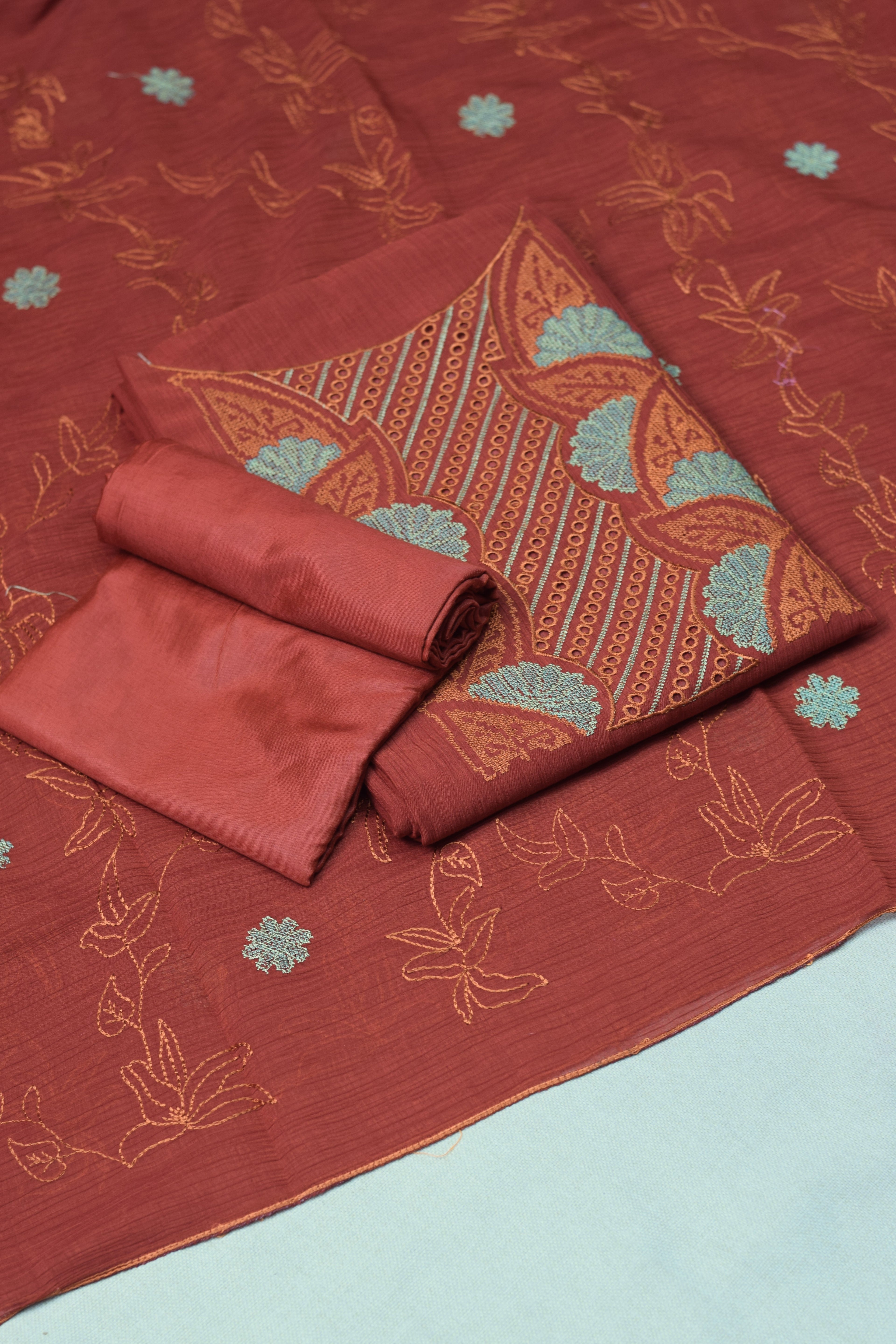 Rust Orange Christ Georgette Churidar Material Set with Embroidered Neck Design & Dupatta