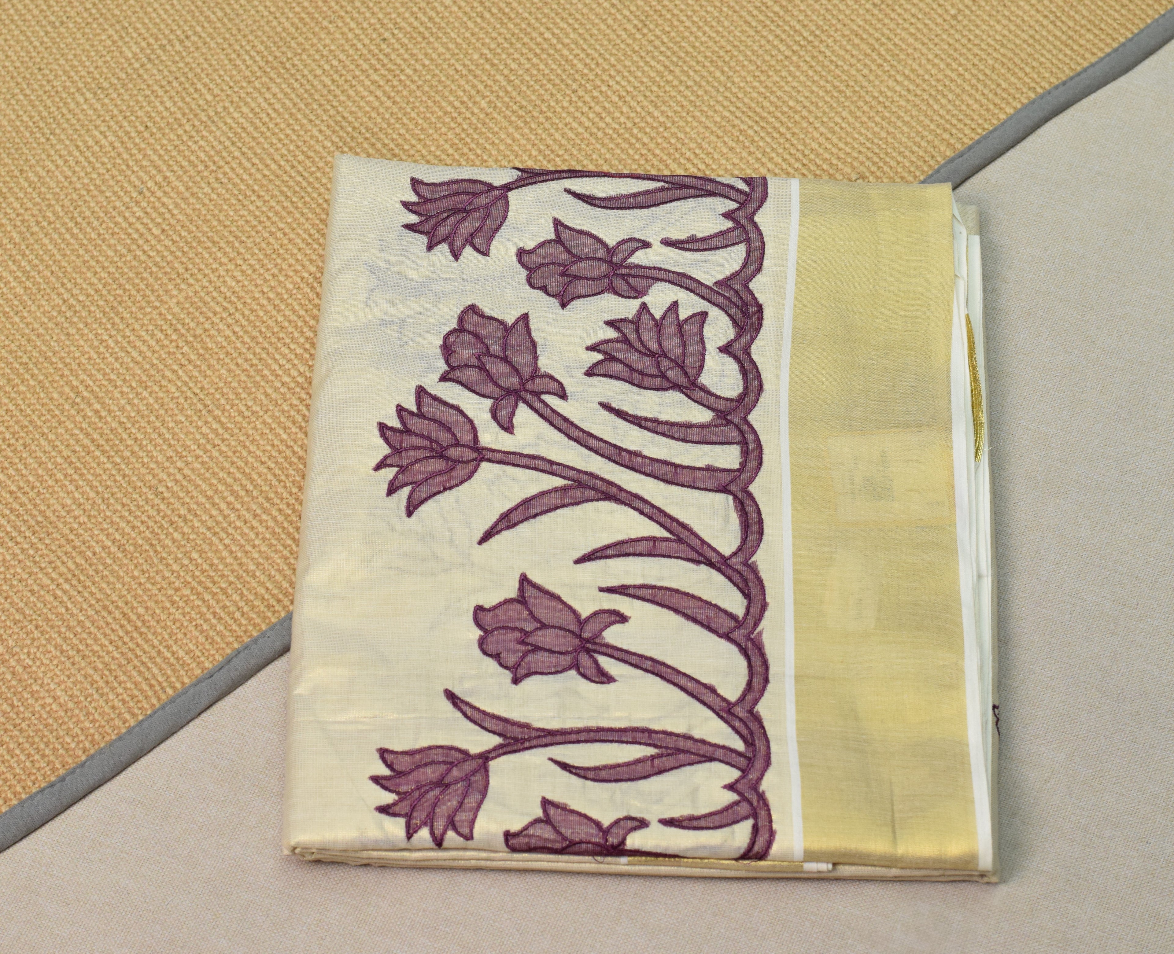 Kerala Tissue Saree with Lotus Embroidery Border &a Matching Blouse Piece