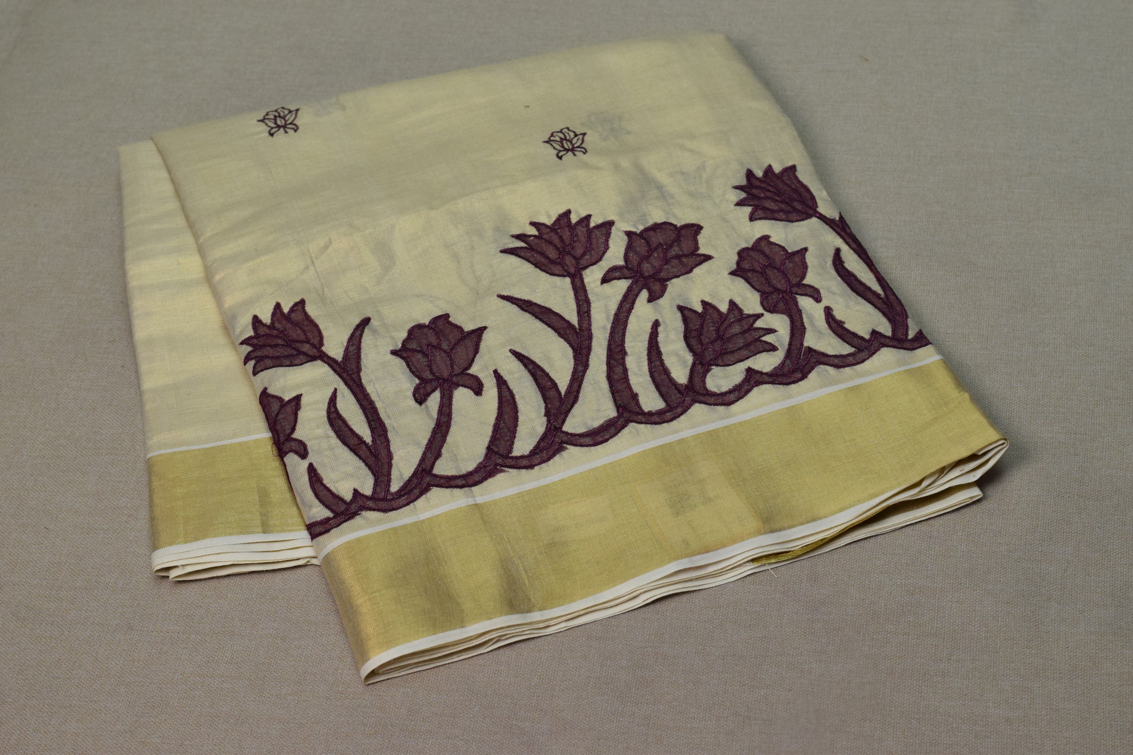 Kerala Tissue Saree with Lotus Embroidery Border &a Matching Blouse Piece