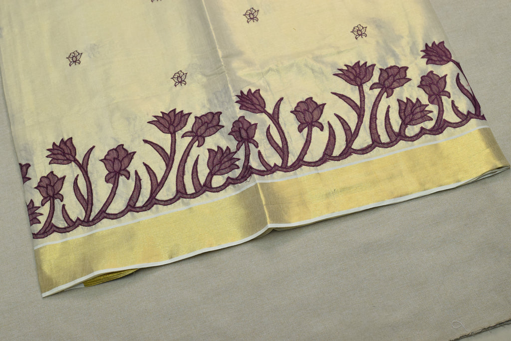 Kerala Tissue Saree with Lotus Embroidery Border &a Matching Blouse Piece