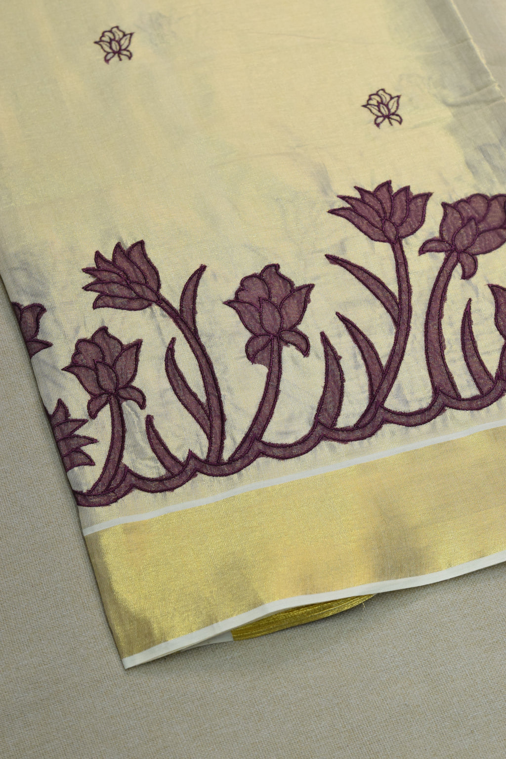 Kerala Tissue Saree with Lotus Embroidery Border &a Matching Blouse Piece