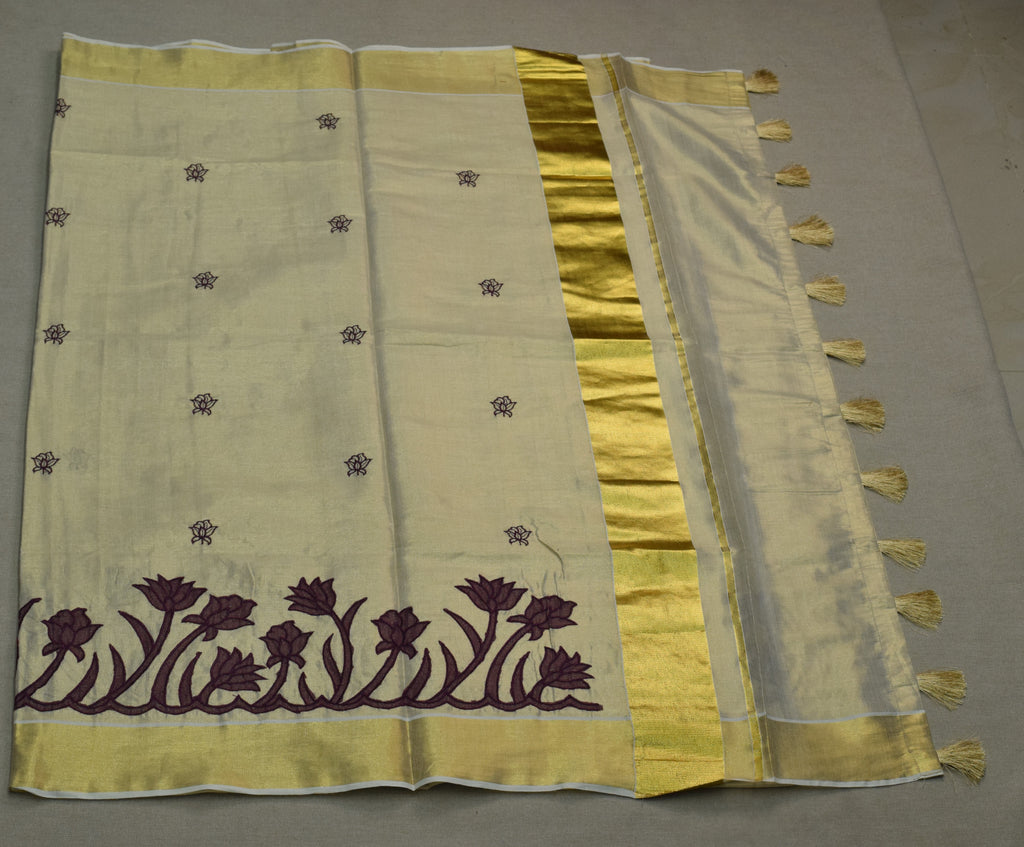 Kerala Tissue Saree with Lotus Embroidery Border &a Matching Blouse Piece