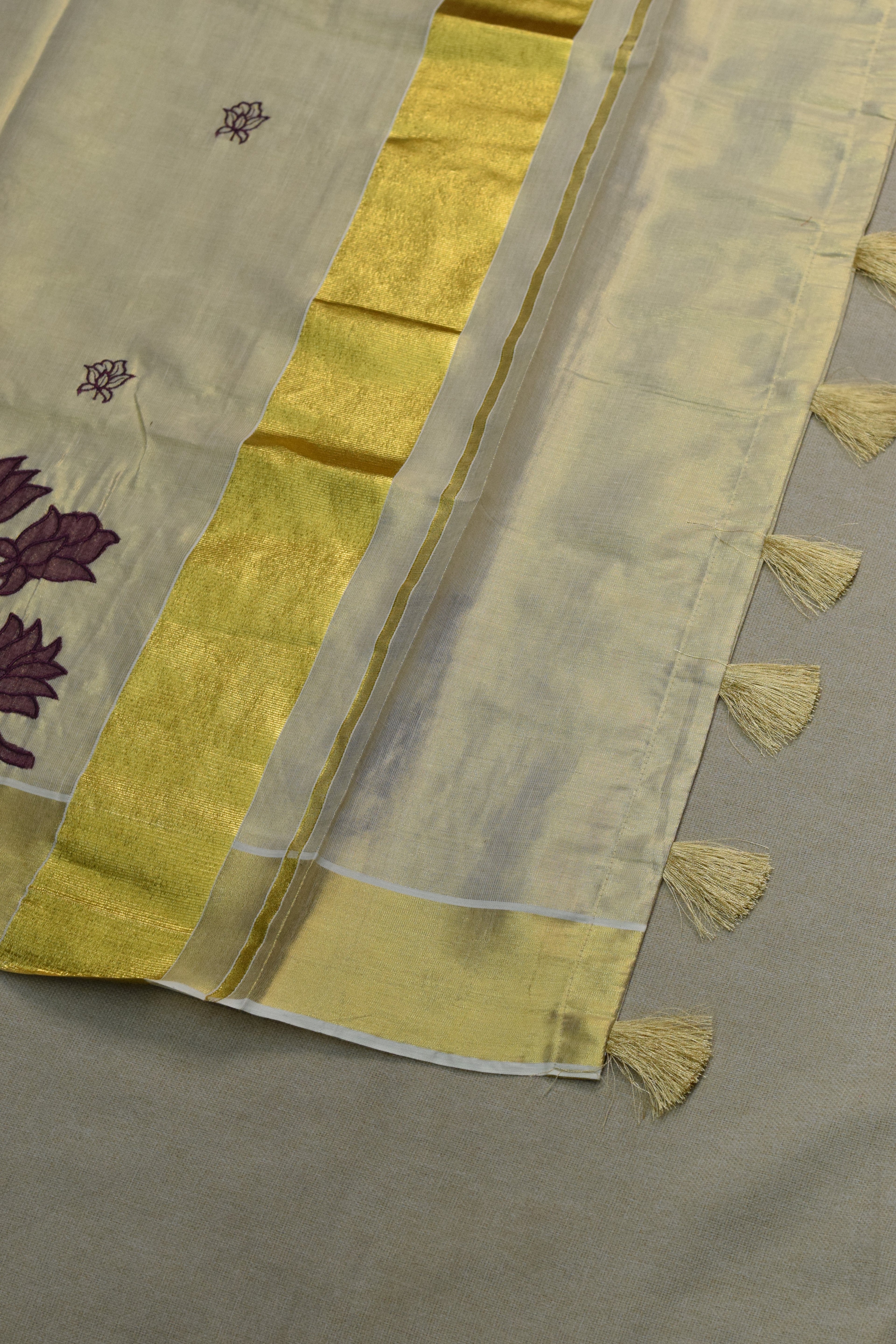 Kerala Tissue Saree with Lotus Embroidery Border &a Matching Blouse Piece