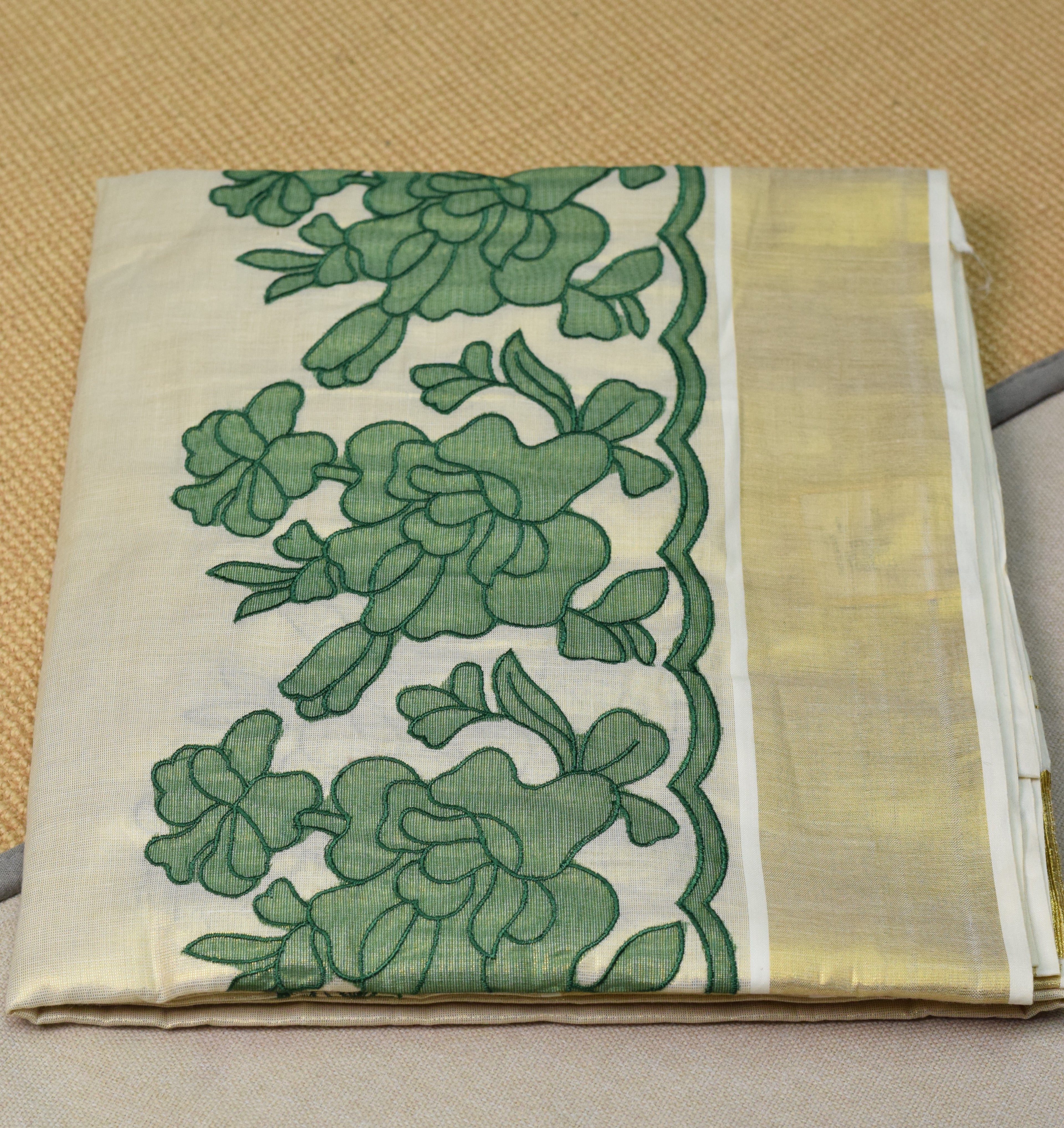 Kerala Tissue Saree with Green Floral Border & Traditional Golden Kasavu