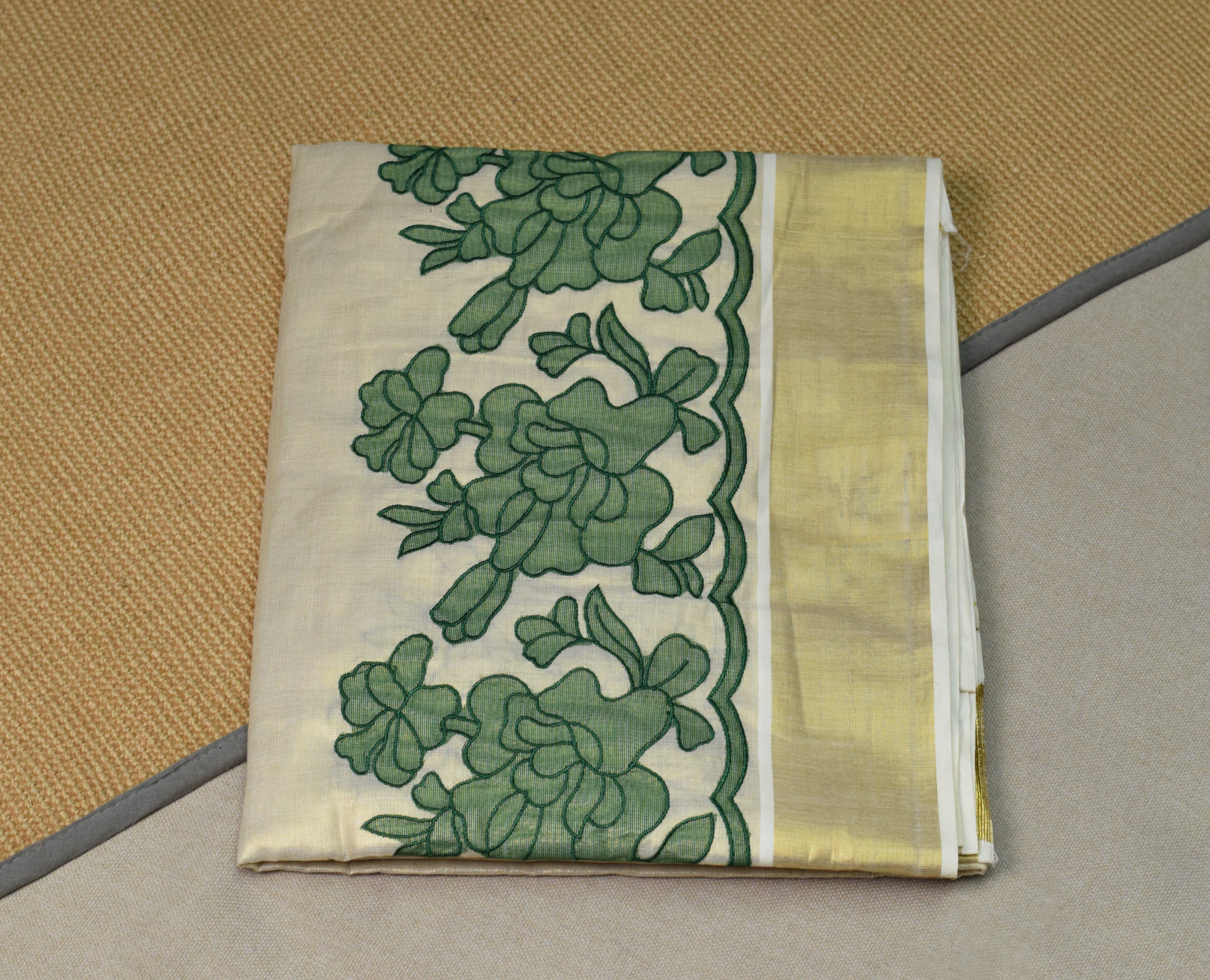 Kerala Tissue Saree with Green Floral Border & Traditional Golden Kasavu