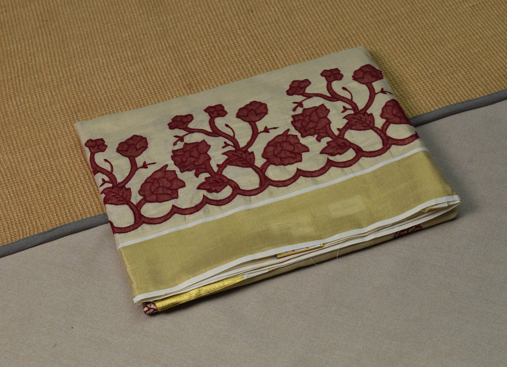 Kerala Tissue Saree with Maroon Floral Embroidery & Golden Kasavu Border