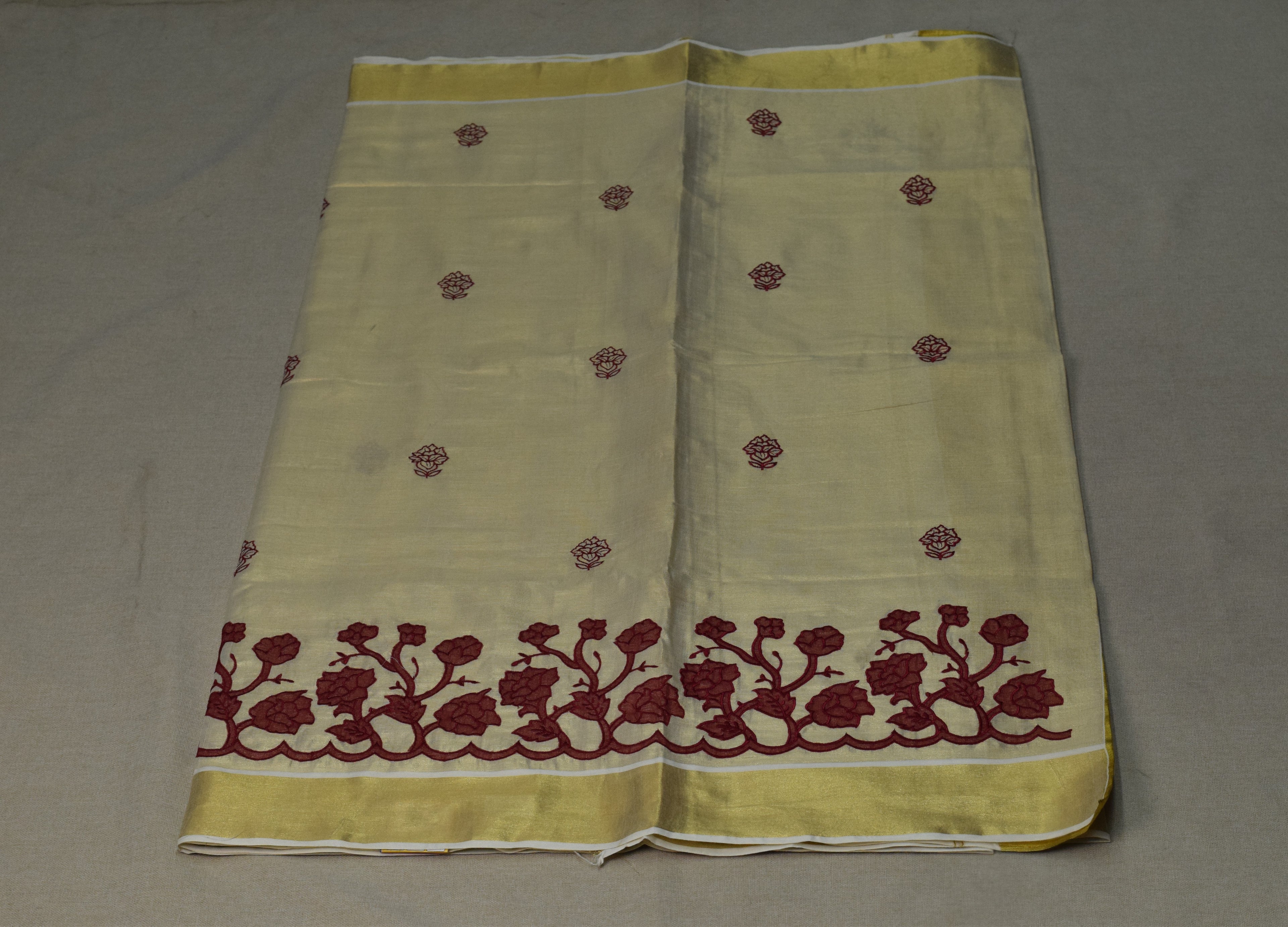 Kerala Tissue Saree with Maroon Floral Embroidery & Golden Kasavu Border