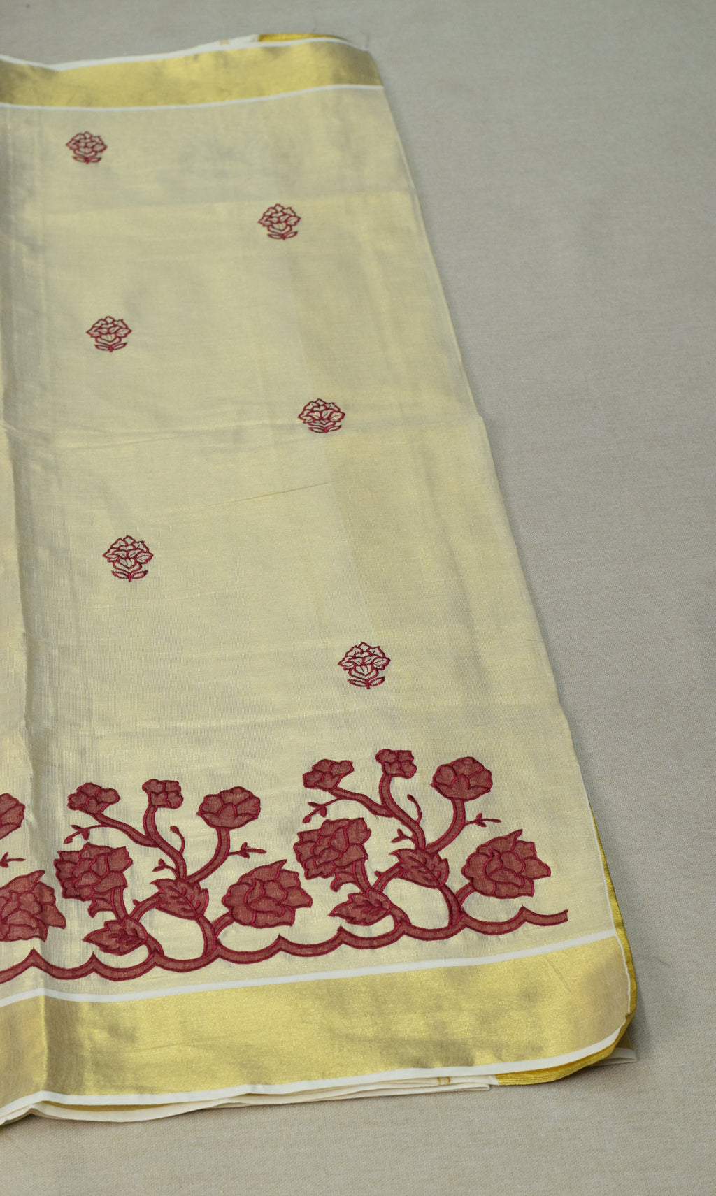 Kerala Tissue Saree with Maroon Floral Embroidery & Golden Kasavu Border