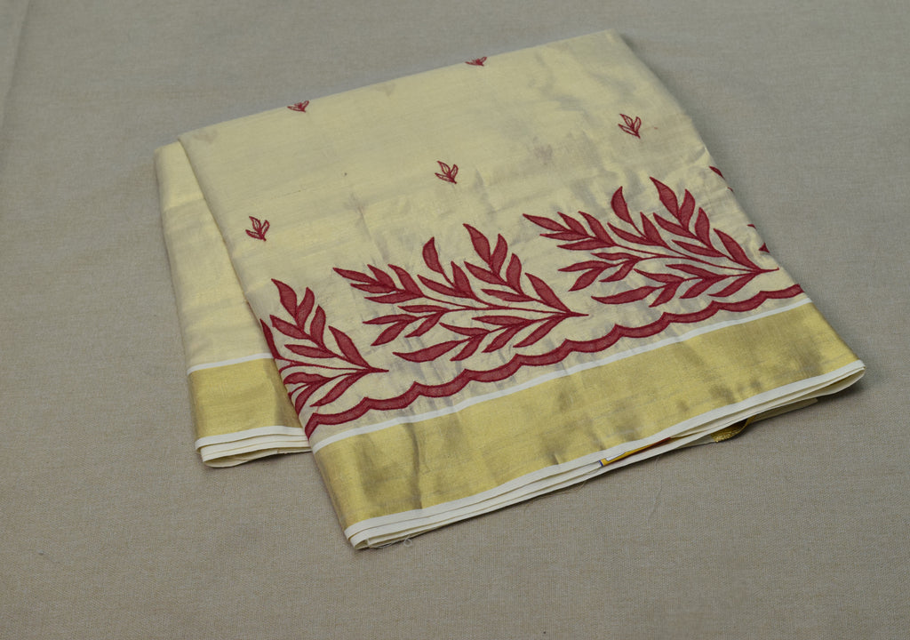 Kerala Tissue Saree with Maroon Floral Embroidery & Golden Border