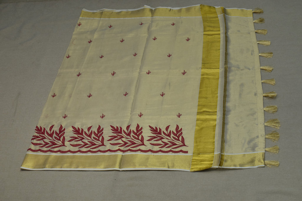 Kerala Tissue Saree with Maroon Floral Embroidery & Golden Border