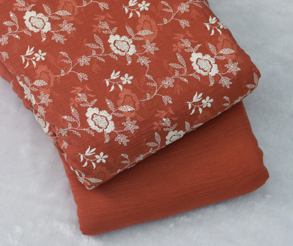 Rust Orange Crushed Georgette Fabric with Elegant White Floral Embroidery – - 44 Inches Width