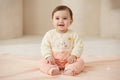 Imported Baby Winter Romper with Button Closure – Light Peach & Cream Bunny Design | 9–12 Months